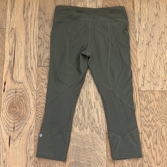 Olive green Lululemon leggings, hit at mid-calf with pockets galore!! - Picture 5 of 9